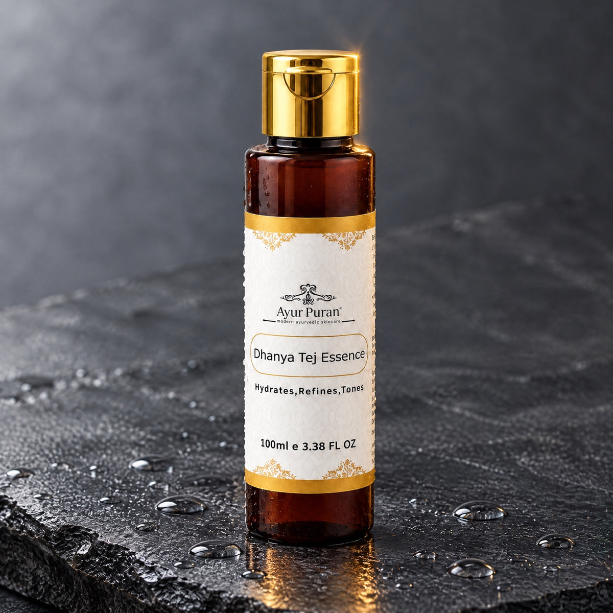 AyurPuran Dhanya Tej Essence bottle on wet slate with water droplets